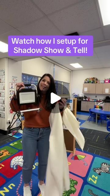 Preschool Vibes on Instagram: "Join us for a shadow show and tell in our classroom! In this video, I set up a large white fleece material, though a white sheet could also work, to create an intriguing backdrop for our activity. My assistant helps the students position themselves behind the sheet where they pull out an item from their backpacks. The rest of the class, watching from the other side, guesses what each item is based solely on its shadow. This fun and interactive game not only excites the students but also introduces them to the concepts of light, shadows, and shapes in a very practical and engaging way. Tune in to see how a simple setup can make for a deeply educational and entertaining classroom activity!" Shadow Activities For Preschool, Story Telling Ideas, Preschool Vibes, Preschool Classroom Setup, Shadow Activities, Simple Setup, Classroom Activity, White Sheet, Light Games