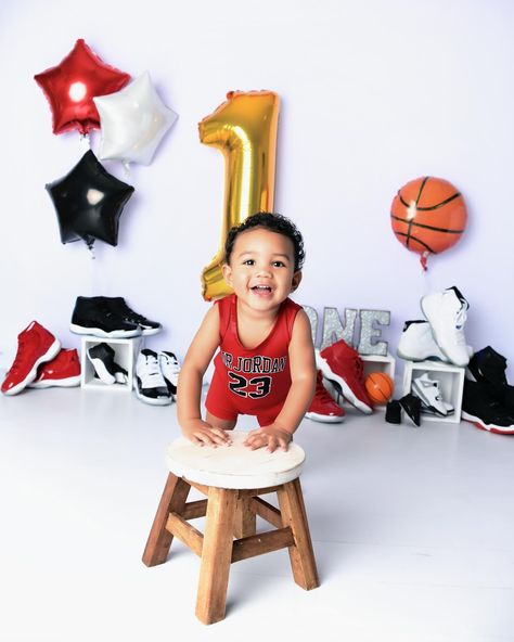 It’s time to celebrate! This little baller’s first birthday photoshoot was a slam dunk! From the gorgeous smiles to the awesome basketball outfit, he’s ready to take on the world! ‌ #firstbirthday #birthdayboy #babyboy #smiles #gorgeous #baller #ballerbaby #ballerstatus #basketball #basketballoutfit #picturemomentsphotography 1st Pictures Birthday Photo Ideas, 1st Bday Basketball Theme, Basketball Theme Photoshoot, Rookie Year First Birthday Basketball, 1 Birthday Photoshoot, Baby Boy Basketball, Basketball Themed Birthday Party, Basketball Theme Birthday, Basketball Outfit