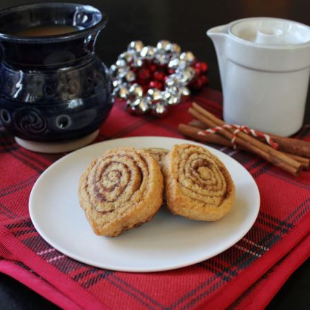 Kanilsnúðar (Cinnamon Snails)  yield: approx. 12  cookies  Ingredients:  175 grams flour 100 grams  unsalted butter  plus 1 Tablespoon salted butter, melted 1/2 tsp hartshorn powder (baker’s ammonia) * or 1/2 tsp. baking powder and baking soda 60 grams sugar 1 egg healthy pinch of salt 1/4 teaspoon vanilla extract Cinnamon Sugar:  2 Tablespoons Sugar 1 teaspoon Cinnamon (or extra if you’re really into cinnamon) Cinnamon Snails Recipe, Cinnamon Snails, December Desserts, Iceland In December, Snails Recipe, Cinnamon Roll Cookies, Trip To Iceland, Cookie Exchange Party, Foreign Food