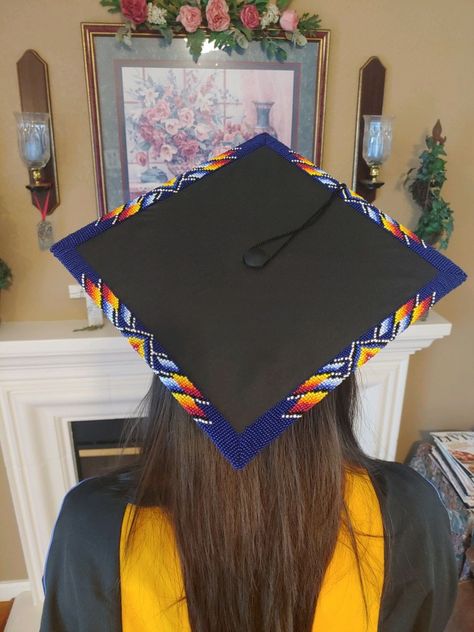 Native Graduation Pictures, Indigenous Graduation Cap, Beaded Grad Cap Ideas, Native Beaded Graduation Caps, Native Graduation Cap, Beaded Grad Caps, Beaded Caps Graduation, Indigenous Graduation, Beaded Graduation Cap Native American