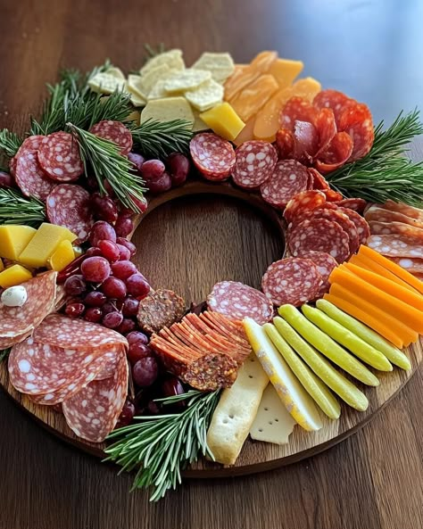 The Christmas Wreath Charcuterie Board is not only delicious but also visually captivating, designed to bring holiday cheer to any table. With its circular layout mimicking a festive wreath, it ... Read more Christmas Charcuterie Board Circle, Round Charcuterie Board Christmas, Charcuterie Wreath Christmas, Christmas Wreath Charcuterie Board, Circular Charcuterie Board, Christmas Wreath Charcuterie, Christmas Wresth, Charcuterie Board Round, Wreath Charcuterie Board