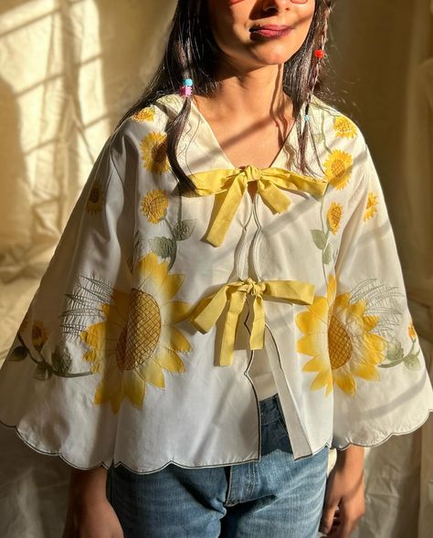 Bask in the summer vibes with our easy breezy “Sunflower” shirt—your new everyday essential! This short has been made from up-cycled fabric with cotton ribbons to make it eco friendly.☀️💛 Size: Medium Price: 2500 rupees #SummerStyle #EffortlessFashion #SunflowerShirt #sustainable #upcycling #upcycletextile Sunflower Shirt, Modesty Fashion, Stylish Party Dresses, Easy Breezy, Effortless Style, Summer Vibes, Everyday Essentials Products, Make It, Sunflower