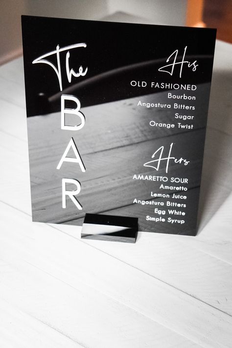 This bar sign is perfect for your modern wedding or event.  The sign is 8" x 10" acrylic, with your choice of gold mirror, rose gold mirror, silver, black or white lettering for 'The Bar' (drink headings i.e 'Signature Drinks' will match colour selected)  Sign colours available: Frosted: menu text body will be in white  Black: menu text body will be in white  White: menu text body will be black  Dimensions: 8" x 10" x 0.1" 20.2 cm x 25.4 cm x 0.3 cm Each sign comes with a stand. Please note that Black And White Signature Drink Sign, His And Hers Wedding Drinks, His And Hers Bar Menu Wedding, Wedding Signage Black And White, Wedding Menu Board, His And Her Drinks Wedding Bar Signs, Bar Events Ideas, Black And White Wedding Theme Decor, His And Her Drinks Wedding