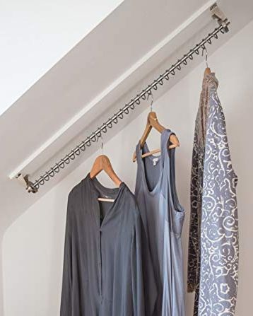 Under stairs storage ideas: the best ideas for an organised space Loft Wardrobe, Closet Under Stairs, Hanging Clothes Rail, Wardrobe Rail, Angled Ceilings, Open Wardrobe, Under Stairs Cupboard, Open Closet, Coat Closet