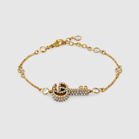 Shop the Double G key bracelet with crystals at GUCCI.COM. Enjoy Free Shipping and Complimentary Gift Wrapping. Key Bracelet, Fall Rings, Resin Bracelet, Gucci Jewelry, Key Necklace, The Double, Beauty Items, Jewelry Gold, Gold Tone Metal