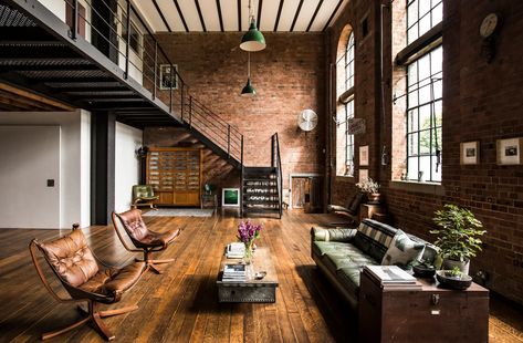 This London location apartment has a large open plan living with exposed brick walls. Double height ceiling and great daylight. Beautiful reclaimed wooden flooring. Exposed Brick Apartment, New Yorker Loft, Loft Apartment Industrial, Brick Apartment, Brick Living Room, Warehouse Apartment, Industrial Loft Design, Open Plan Apartment, Warehouse Living