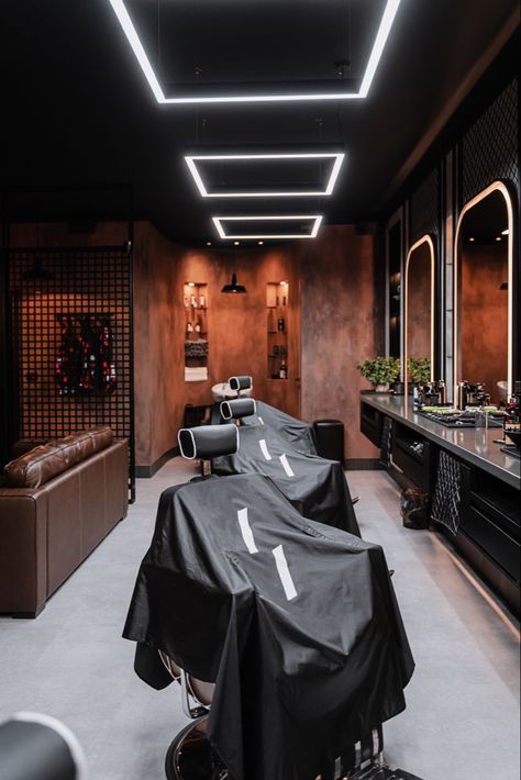 Dark Barber Shop Interior, Black Barbershop Design, Men's Barber Shop Decor, Barber Shop Lighting Ideas, At Home Barbershop, Barber Shop Color Palette, Barber Studio Ideas Luxury, Old School Barbershop, Barbershop Lighting Ideas