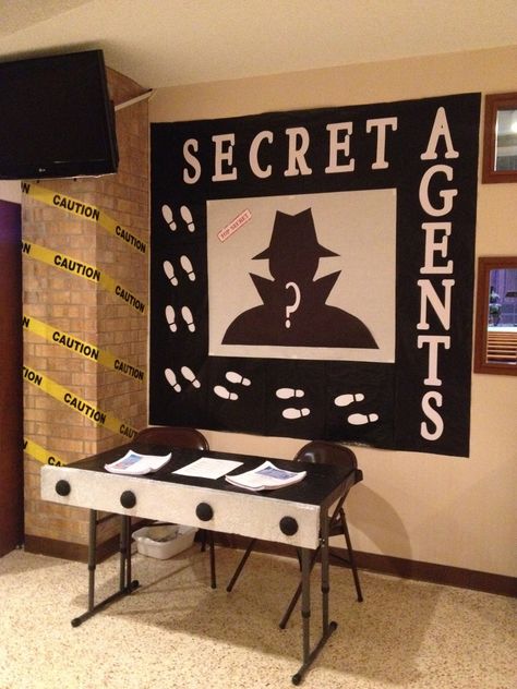 Vbs Spy Theme Decorations, Mystery Theme Classroom, Mission Possible School Theme, Clue Themed Hallway, Detective Bulletin Board Ideas, Vbs Detective Theme, Mission Possible Theme Ideas, On The Case Vbs Decorations, Detective Decorations