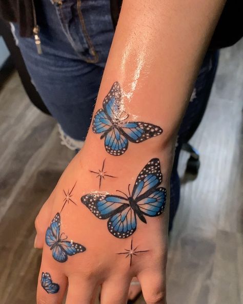 Anaheim CA📍 on Instagram: “🦋🦋#butterfly #bluebutterfly #handtattoo #butterflytattoos #girlytattoo #butterflydesign #colortattoo #bluetattoo #sparkletattoo #sparkle…” Blue Butterfly Tattoo, Butterfly Hand Tattoo, Girl Thigh Tattoos, Skull Rose Tattoos, Hand Tattoos For Girls, Cute Hand Tattoos, Pretty Hand Tattoos, Hip Tattoos Women, Black Girls With Tattoos