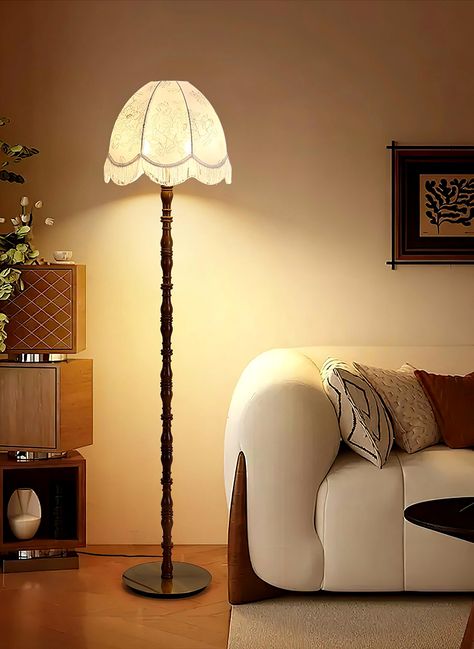 Transform your living area with the Printed Tassel Floor Lamp. This lamp showcases a beautifully patterned lampshade complemented by charming tassel accents, embodying timeless elegance. Its rich walnut base introduces warmth and sophistication, making it an ideal fit for classic or vintage interiors. Meticulously crafted for a luxurious touch. If you have any questions about our products, please contact us and we will reply to you within 24 hours. Product Size: Diameter 40cm x Height 16 Vintage Floor Lights, Vintage Brass Floor Lamp, Tassel Lamp, Retro Floor Lamps, Fabric Floor Lamp, Vintage Interior Decor, Recessed Wall Lights, Arm Floor Lamp, Lamp Vintage