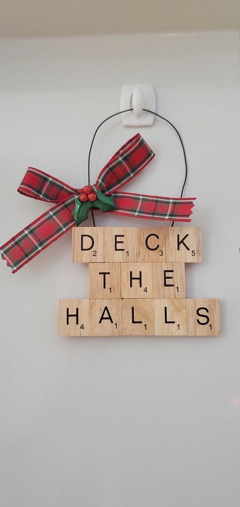 DECK THE HALLS with this charming handmade ornament! A unique gift for the scrabble aficionado in your life- it's also perfect for secret santas, stocking stuffers, hostess gifts- anyone! Every ornament is handmade to order using individual scrabble tiles that are backed in soft red velvet and hung with sturdy black wire. Trimmed with classic plaid ribbon and festive mistletoe, you'll be sure to enjoy this unique gift for years to come! Your ornament will arrive in a gift box- perfectly packaged and ready for gift giving. Thank you for shopping at ScratchMade Co and supporting my small business!  Visit my shop to check out all of our products: https://www.etsy.com/shop/ScratchMadeCo *As with all handmade items, slight variations in shapes and colors are to be expected. Christmas Scrabble Ornaments, Christmas Crafts With Scrabble Tiles, Crafts With Scrabble Tiles, Scrabble Pieces Crafts, Scrabble Tile Crafts Diy, Christmas Scrabble Tiles, Scrabble Christmas Ornaments, Scrabble Christmas, Scrabble Letter Crafts