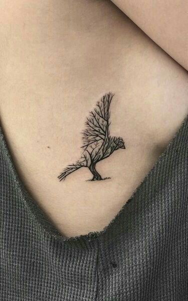 215+ Hawk Tattoos Ideas and Designs (2023) - TattoosBoyGirl Falcon Tattoo, Rabe Tattoo, Small Rib Tattoos, Hawk Tattoo, Cage Tattoos, Ribcage Tattoo, Men Tattoos, Crow Tattoo, Raven Tattoo