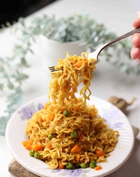 There is so much to experiment with instant noodles! Here are four amazing maggi recipes with a twist in one post that you must try - Italian Maggi that will taste like your favorite pasta, Cheese and Egg Maggi that will make everyone on the table fight for the last sinful bite, Chinese Maggi that will remind you of chinese street food and Spicy Masala Maggi that will satisfy the old school tastebuds! #myfoodstory #recipe #indian #noodles #italian #chinese #packet #seasoning via @my_foodstory Maggi Photo, Maggi Seasoning Recipes, Maggi Aesthetic Food, Maggi Noodles Recipes Indian, Maggie Noodles Photography, Recipes Using Maggi Seasoning, How To Make Tasty Maggi, Maggi Masala, Nepal Food