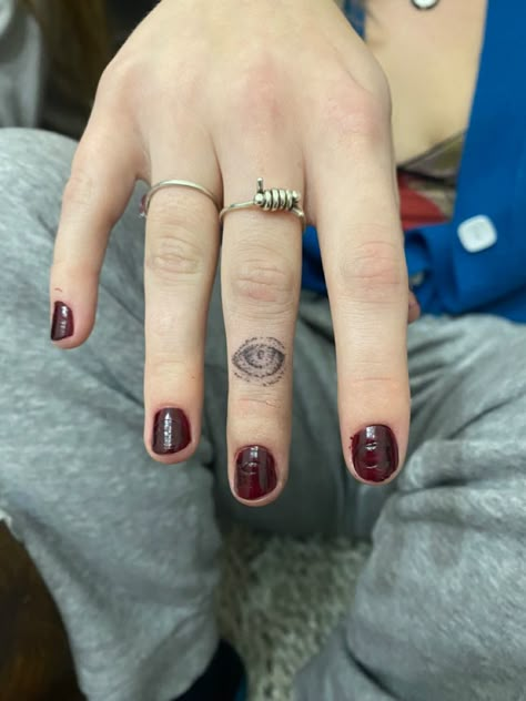 Eye Tattoo Stick And Poke, Stick And Poke Eye Tattoo, Eye On Finger Tattoo, Hand Poke Finger Tattoo, Eye Tattoo On Finger, Finger Stick And Pokes, Eye Ball Tattoos, Eye Stick And Poke, Dot Finger Tattoo