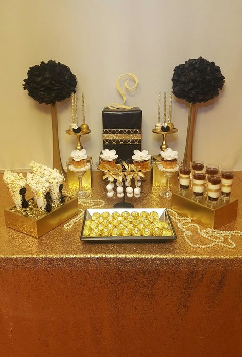 Gold and black themed dessert table Gold And Black Themed Birthday Party, Black And Gold Food Table Decorations, Black And Gold Food Ideas, Black And Gold Cake Table, Gold Dessert Table Ideas, Dessert Table Ideas Black And Gold, Black And Gold Wedding Dessert Table, Dessert Table Black And Gold, Birthday Dessert Table Black And Gold