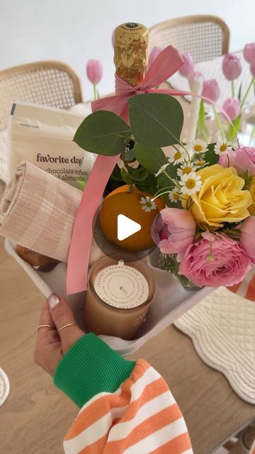 Deborah Trette on Instagram: "save your drive through drink carriers! & add a bottle of bubbly, chocolate, flowers, a candle + dish towel for the perfect hostess gift this summer! I also included an orange for mimosas! 🍊

save and share! 🔗 under @shop.ltk

#diygifts #giftidea #giftforher #hostessgift #hostess #teachergifts #summergift #dinnerparty #targetfinds" Drink Carrier Gift Ideas, Baby Shower Hostess Gift Ideas, Bubbly Chocolate, Baby Shower Hostess Gifts, Gift Instagram, Hostess Gift Ideas, Shower Hostess Gifts, Drink Carrier, Candle Dish