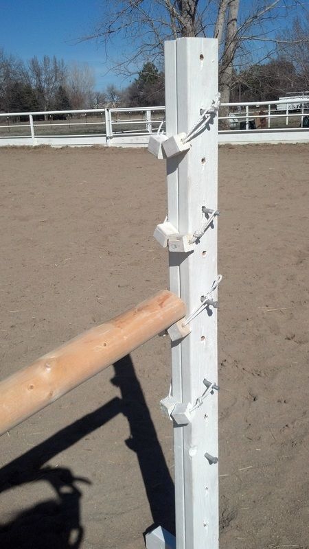 Home Made Jump Cups.  Carriage bolt, wood blocks, rope.  Super cheap and easy! Homemade Jumps Horses, Diy Jump Standards, Homemade Horse Jumps, Horse Jumping Exercises, Cross Country Jumps, Horse Jumps, Horse Arena, Diy Horse, Horse Exercises