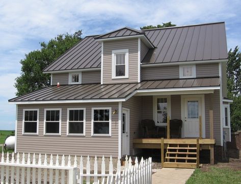 What Color Metal Roof Goes With Tan Siding | Storables Tan House With Metal Roof, Tan House Roof Colors, Gray Metal Roof Houses Color Combos, Tin Roof Colors, Burnished Slate Metal Roof, Tan Siding, Construction Tools Buildings, Black Metal Roof, Metal Roof Houses