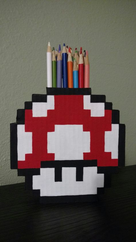 8 bit pixel art Mario mushroom pencil holder made from cardboard and cereal boxes Gamer Baby, Diy Pencil Holder, Geek Diy, Diy Room Decor For Teens, Block Craft, Pencil Holder, 8 Bit, Fanarts Anime, Diy Room Decor