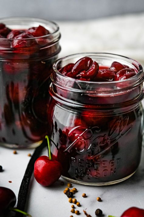 transferring pickled cherries to glass mason jars. Pickled Fruit, Pickled Cherries, Bing Cherries, Fermentation Recipes, Cherry Recipes, Pickling Recipes, Fermented Foods, Canning Recipes, Fruit Recipes