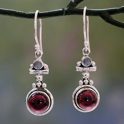 Rich red garnet glows from a sterling silver sky. Bhavesh in India presents an original pair of dangle earrings featuring the unique presence of rainbow moonstone.  Made in India Silver Earrings Indian, Handmade Silver Earrings, Moonstone Drop Earrings, Boho Drop Earrings, Blue Opal Earrings, Earrings Indian, Garnet Earrings, Moonstone Earrings, Moonstone Jewelry