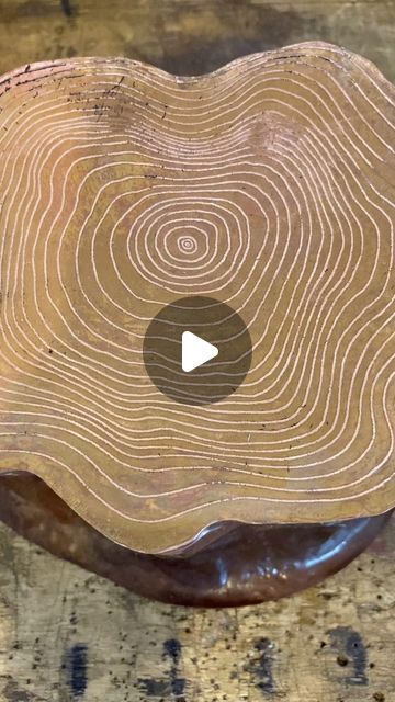 Laara Cerman | Artist + Maker on Instagram: "Prepping for etching. My tree ring design was printed on a laserjet printer, then transferred onto scuffed up metal with acetone and gently burnished with a popsicle stick. The design didn’t completely transfer so I filled in the gaps with sharpie. After etching in Ferric Chloride for 30 minutes, I then removed the laser jet print resist with acetone.  . In my early attempts with this project I first etched a piece of copper and thought I could form it and solder it to the copper stump base but realized that would be way too difficult!  So, I took what I learned from other jewellers and treated this like soldering a backplate to an XXXL bezel, trimmed the “backplate” edges, then etched the top.  . . . . . #MetalEtching #TreeRingArt #EtchingProce