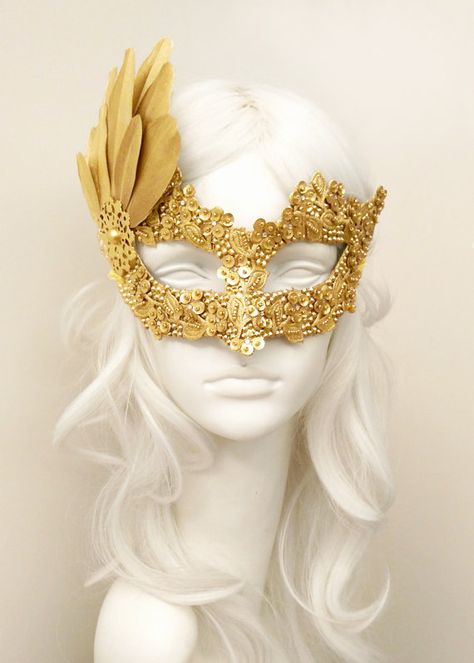 Gold color Venetian mask with rhinestone and bead embellishments, fabric applique, sequin flowers and gold feather fan. PAYMENT: Following your order placement, you will receive an email from Shopier, which is integrated into Etsy with the Etsy API for payments. You can pay via “Pay Now” button in this email. Your order will be delivered with online tracking by DHL or UPS. Back surface is covered with fabric for comfortable use. Ribbons added both sides to tie. (Ribbons may be slightly differ... Gold And White Mask, Mascarade Mask Diy, Masquerade Mask Diy, Gold Masquerade Mask, Mask Carnival, Sequin Flowers, Masquerade Ball Mask, Makeup At Home, Prom Costume