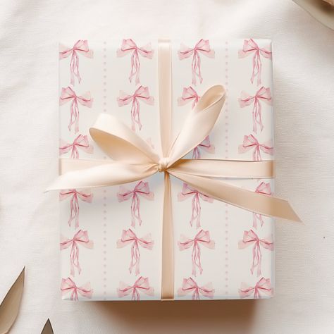 This watercolor pink bows gift wrap is great wrapping paper for any small or medium sized gift. It features edge-to-edge printing on a premium matte paper for a sophisticated look. *The gift wrap is sold in a set of 5 or 10 sheets. *Each sheet measures 20" x 29" *Rolled and shipped in a cardboard tube *Beautiful matte finish *Paper stock: 70# opaque *Quality paper folds crisp *Due to various monitor settings, the actual item may appear to be slightly different in color than what you see on your Aesthetic Wrapping Paper, Pink Christmas Wrapping Paper, Pink Gift Wrap, Xmas Wrapping Paper, Pink Wrapping Paper, Gift Wrapper, Pink Xmas, Birthday Wrapping Paper, Christmas Wrapping Paper