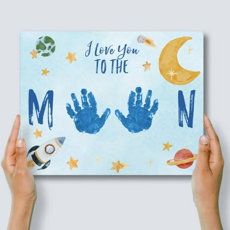 My BESTSELLING handprint craft, now beautifully printed for you on 11x14" canvas. A unique and creative way to cherish those little hands- which won't stay little for long! This "I Love You To The Moon" canvas with a whimsical, watercolor space scene will be shipped to you WITHOUT handprints on it so that your child can add 2 painted handprints directly onto the canvas. This way, you can personalize it yourself with original handprints from your child.  (See detailed crafting instructions below) Patriotic Handprint Art, Art Activities For One Year Olds, Toddler Hand Painting Ideas, Dad Canvas From Kids, Grandparent Toddler Craft, Easy Projects For Toddlers, Kids Handprint Art For Dad, Footprint Art For Grandma, Diy Crafts For Dads Birthday