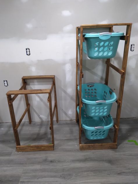 "This finished Laundry Basket Holder is a great addition to any living space. It can be used to sort clothes and organize laundry or use it in a play room to store toys for kids. Laundry Basket Organizer - Great for laundry - child toys - pet toys - organizing garage items - basement items - craft room many endless uses. Approx. Dimension: 2 Shelf:   32\" tall, 27\" depth, 20\" wide 3 Shelf:   47\" tall, 27\" depth, 20\" wide 4 Shelf:   58\" tall, 27\" depth, 20\" wide   Laundry Baskets NOT incl Farmhouse Laundry Basket, Organize Laundry, Organizing Garage, Laundry Basket Organizer, Kids Laundry Basket, Laundry Basket Holder, Garage Laundry Rooms, Laundry System, Laundry Sorting