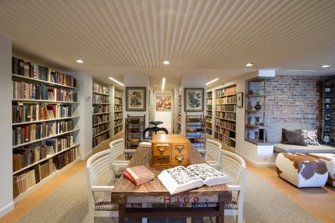 Basement Library, Brick Wall Living Room, Rec Rooms, Home Library Rooms, Basement Family Room, Library Wall, Brown Floors, Mid Century Living Room, Home Libraries