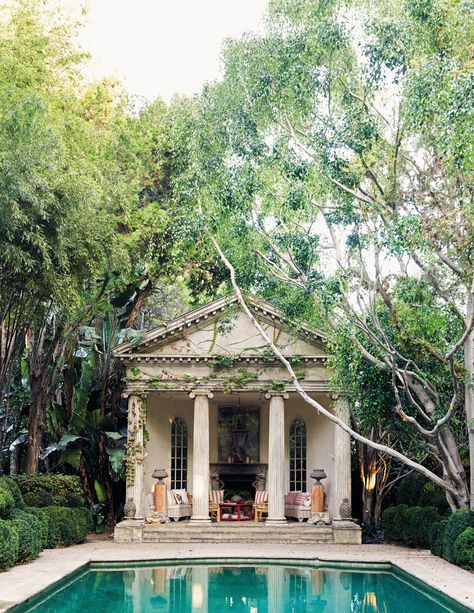 At designer Richard Shapiro's home, the garden folly’s columns and pediment resemble stone but are made of redwood and fiberglass and distressed to look old. | archdigest.com Richard Shapiro, Beachfront Home, Construction Drawings, Greek Revival, Old World Style, Los Angeles Homes, Pool Houses, Landscape Architect, Architectural Digest