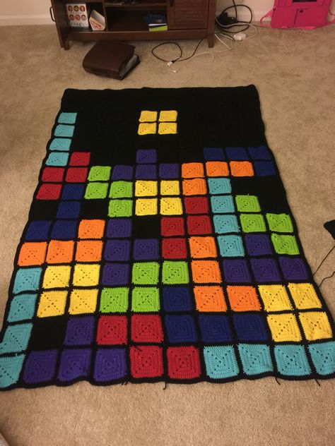 Tetris blanket I made for my brother. So much fun! Tetris Crochet, 8 Bit Crochet Blanket, Crochet Video Game Blanket, Nerdy Crochet Blanket, Crochet Tetris Blanket, Tetris Crochet Blanket, Crochet Tetris Blanket Pattern, Tetris Crochet Blanket Pattern, Tetris Blanket