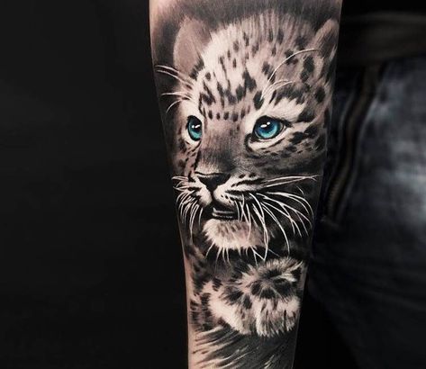 Perfect 2 colors realistic tattoo style of Snow Leopard with Blue eye done by artist Cox Tattoo | Post 20328 | World Tattoo Gallery - Best place to Tattoo Arts Snow Leopard Tattoo, Model Tattoos, Leopard Tattoo, Jaguar Tattoo, Cubs Tattoo, Tier Tattoo, Leopard Tattoos, Animals Tattoo, Tattoo Concepts