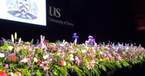 Graduation Ceremony Stage Design, Graduation Stage Decorations Flowers, Graduation Ceremony Decorations Stage, Graduation Floral Arrangements, Graduation Stage Design, Graduation Stage Decorations Schools, Graduation Ceremony Decorations, Stage Flowers, Graduation Stage