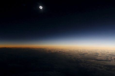 A total solar eclipse as seen from the window of a plane Paris In January, Russian City, Eclipse Solar, Solar Eclipses, Pictures Of The Week, Genetically Modified, Time Photo, Solar Eclipse, Airplane View