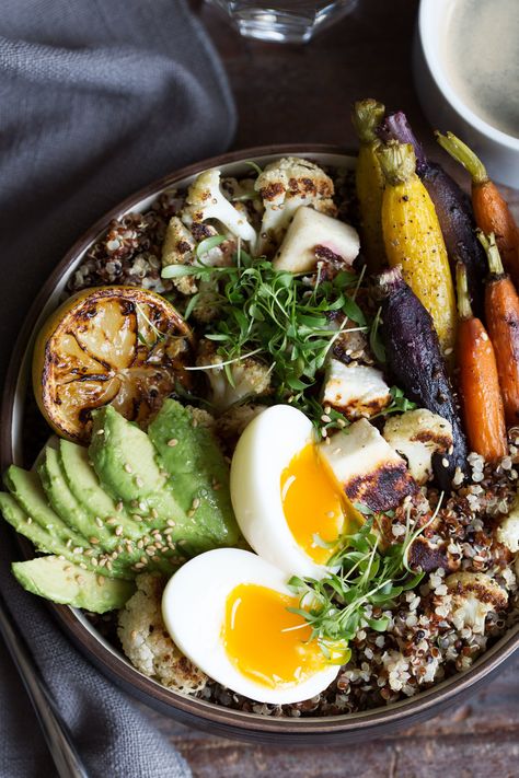 grain bowl with quinoa, soft-boiled egg, roasted carrots and cauliflower recipe from Cooking with Cocktail Rings Breakfast Grain Bowl, Halloumi Cheese, Grain Bowl, Soft Boiled Eggs, Low Cholesterol, Toasted Sesame Seeds, Roasted Carrots, Breakfast Bowls, Bowls Recipe