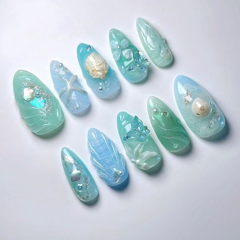 🩵 Aquamarine 🪸 I wanted to create a vibe that makes you think of the ocean 🐠 custom design for my own press ons to wear this summer with my favourite blue+green shades 🫧 you can place an order for press ons at janetsnails.com ✨ #naildesign #3dnailart #3dnails #summernails #nailinspo #gelxinspo #chromenails #fairycorenails #mermaidnails #shellnails #beachnails #naturenails #nails2inspire #pressonnails #pressons #vancouvernails #gelxnails Turquoise Mermaid Nails, Green Ocean Nails, Blue And Green Nail Art, Green And Blue Nail Ideas, Green Beach Nails, Aquamarine Nails Design, Blue And Green Nails Designs, Green Blue Nails, Ocean Inspired Nails