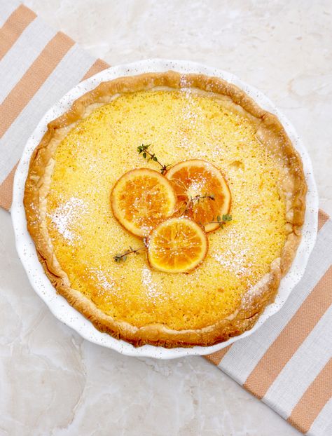 Orange Chess Pie is a variation on the classic Southern Pie. Made with buttermilk, eggs, butter and sugar, it can best be described as a type of custard pie.This pie is very easy to make. The ingredients come together quickly with an electric mixer and are poured into an unbaked pie crust. Southern Buttermilk Pie, Southern Pies, Ricotta Cookies, Chess Pie, Buttermilk Pie, Orange Muffins, Pie Day, Yogurt Cake, Custard Pie