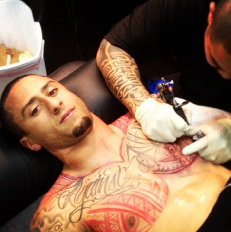 colin kaepernick tattoos | Colin Kaepernick’s chest tattoo updated with tribal design (Picture ... Chest Tattoo Family, Collin Kaepernick, Family First Tattoo, 49ers Quarterback, Athletic Supporter, Best Football Team, Colin Kaepernick, Celebrity Tattoos, Chest Tattoo