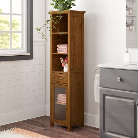 Greyleigh™ Bayard 17" W x 65" H x 13.5" D Free-Standing Linen Cabinet | Wayfair Bathroom Standing Cabinet, Wall Mounted Bathroom Cabinets, Bed Linen Design, Tempered Glass Door, Linen Cabinet, Wall Mounted Cabinet, Cabinet Shelving, Storage Towers, Toilet Storage