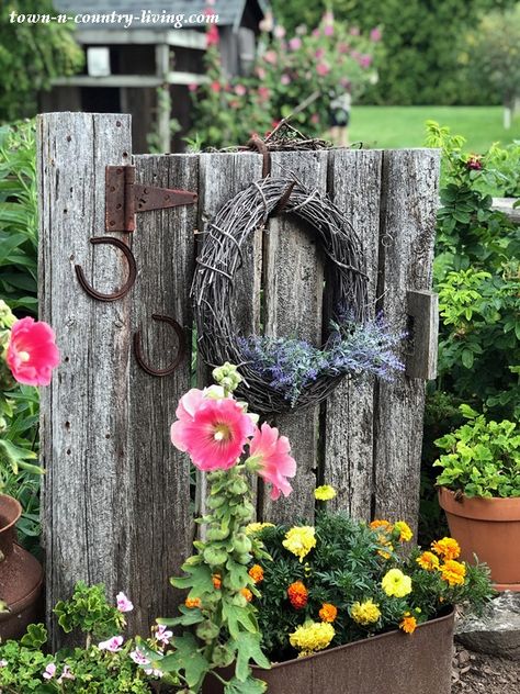 Tour a Country Garden at the Farm - Town & Country Living Rustic Fences And Gates, Old Wooden Gates Ideas, Farm Yard Landscaping Country Living, Rustic Fence Ideas Country Living, Rustic Driveway Entrance, Rustic Shelves Diy, Small Home Garden, Old Garden Gates, Garden Gate Ideas