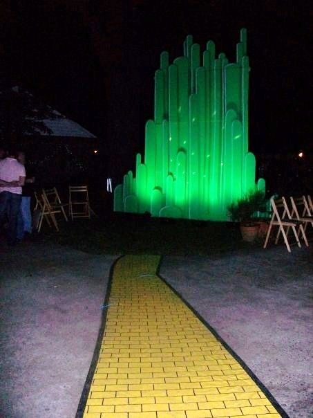 The Wiz Party Ideas Emerald City, Emerald City Prom Theme, Emerald City Set Design, Emerald City Trunk Or Treat, Wizard Of Oz Emerald City Decorations, Wizard Of Oz Decorations Emerald City, Wizard Of Oz Yard Decorations, Emerald City Backdrop, Wizard Of Oz Outdoor Decor