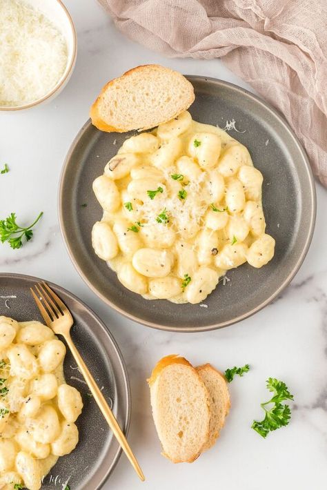 Soft, pillowy gnocchi is covered in a creamy sauce made with heavy cream, butter and shaved black truffle. This simple dish takes only 15 minutes to make but will be sure to impress with its rich flavorful special sauce. (Blue Truffle Sauce Recipe, Truffle Cream Sauce, Spicy Honey Chicken, Black Truffles, Truffle Cream, Truffle Sauce, Marinara Recipe, Truffle Salt, Cherry Tomato Pasta