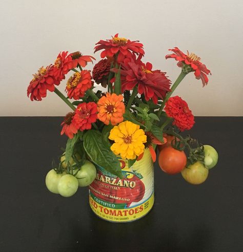 Tomatoes and zinnias Tomato Flower Arrangement, Tomato Can Flower Arrangements, Italian Inspired Floral Arrangements, Tomato Arrangement, Tomato Themed Birthday Party, Tomato Dinner Party, Tomato Party Theme, Tomato Centerpiece, Italian Flower Arrangements