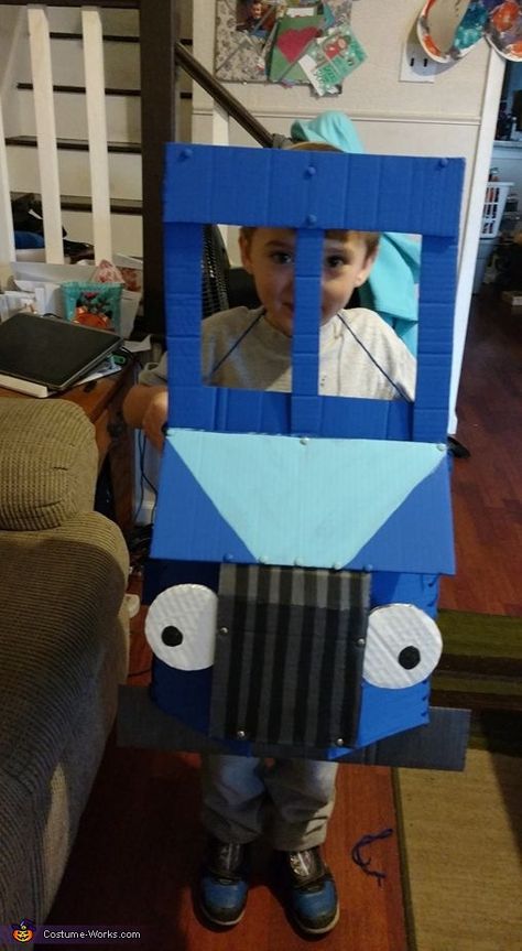 Roberta: This is my son Jherek in his little blue truck costume. His kindergarten class did a story book parade on Halloween. we were encouraged to make a costume of our... Little Blue Truck Costume, Truck Costume, Book Parade, Little Blue Truck, Halloween Costumes 2016, Book Character Costumes, Homemade Costume, Costume Works, Cardboard Painting