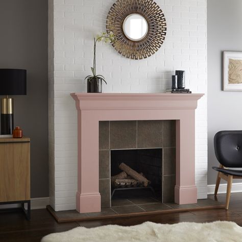 Everybody could use a little more pink in their life. This glamorous fireplace from Maggie, of @POPSUGARHome, features BEHR Paint’s Everything’s Rosy. When paired with a bright white brick wall, neutral gray accents, and touches of gold, this modern blush tone creates an elegant style that’s worth drooling over. Click here for more inspiration on how you can incorporate the blush trend in your own home. Pink Stone Fireplace, Box Mantel Pink, Pink Marble Fireplace, Pink Fireplace Mantle, Glamorous Fireplace, Pink Marble Fireplace Surround, Pink Fireplace, Pink Mantel, Fireplace Refacing