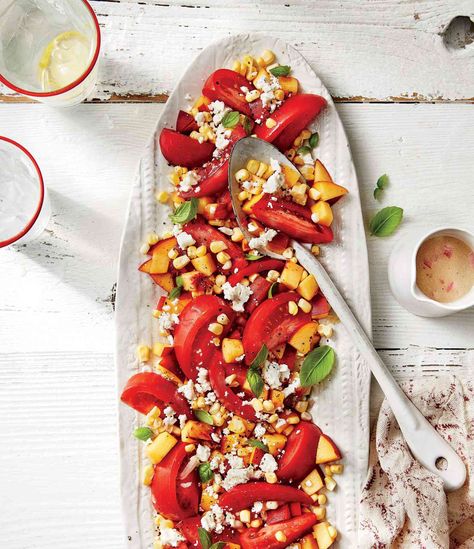 Summers are synonymous with salads—from green, leafy salads and pasta salad to Southern staples like chicken salad and potato salad. But instead of calorie-dense, mayo-filled picnic salads, it's time to put that bounty of seasonal fruits and vegetables to good use. This fresh, vibrant recipe is filled with garden and farmers' market finds, but it doesn't require a lot of ingredients. However, you'll discover the best of the season is highlighted here. Just make sure everything used is at its ... Fresh Tomato Recipes, Leafy Salad, Corn Salad Recipes, Quick Dishes, Summer Side Dishes, Tomato And Cheese, Corn Salad, Summer Vegetable, Corn Salads