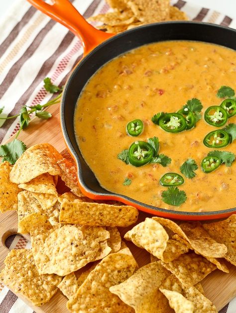 This healthy queso dip is about as healthy as you'll get when it comes to a decadent, cheesy dip. You'll love the subtle sweetness and vibrant color that the butternut squash adds. This one is a must-try! Get the appetizer recipe on RachelCooks.com! Butternut Squash Queso, Butternut Squash Dip Recipes, Butternut Squash Dip, Organic Dinners, Healthy Queso Dip, Healthy Queso, Squash Appetizers, Squash Dip, Queso Recipes