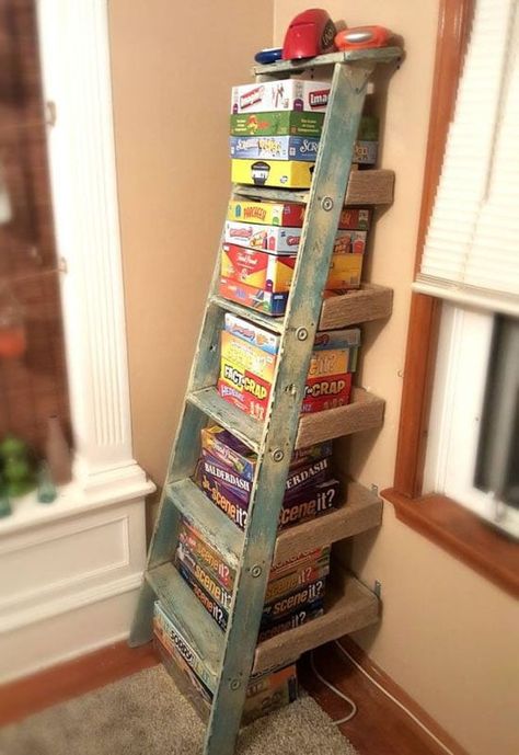 Repurposed Ladder Shelf, Interior Design Country, Repurposed Ladders, Ladder Shelf Diy, Board Game Storage, Hangout Room, Old Ladder, Game Room Family, Youth Room